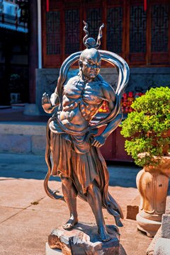 Bronze sculpture of a heavenly warrior in Dingguang Temple, aka White Pagoda Temple, Fuzhou, Fujian Province, China
