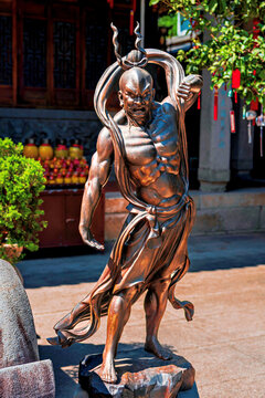 Bronze sculpture of a heavenly warrior in Dingguang Temple, aka White Pagoda Temple, Fuzhou, Fujian Province, China