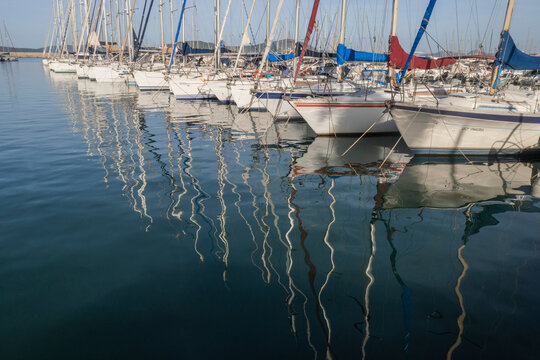 Yachts and reflections, Marina at Alghero, Sardinia, Italy