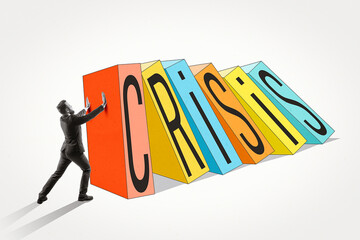 Conceptual image of businessman preventing domino effect labeled crisis. Symbol of risk management, leadership, economic stability, problem solving and business protection strategy.