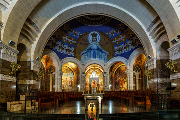 Obraz premium Interior of the Basilica in the Sanctuary of Lourdes, France. Mayor pilgrimage spot for Catholics