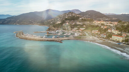Obraz premium Aerial view of Ventimiglia with Mediterranean coastline and historic old town