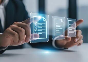 Hands interacting with futuristic holographic digital documents and data on a screen