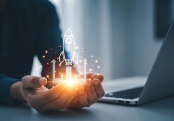 Hands launching a glowing lightbulb idea into the air with a laptop in the background