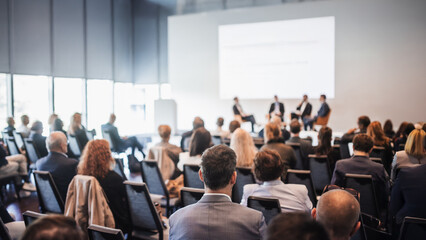 Interview and round table discussion at business convention and presentation. Audience at the conference hall. Business and entrepreneurship symposium. © kasto