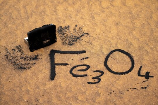 Iron oxide, Fe3O4 collected from sand with magnets, Namib desert near Walvis Bay, Namibia