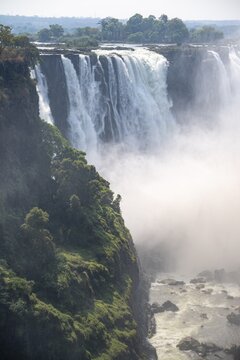 Water plunges into the depths, Victoria Falls with gorge, Zambezi, Zimbabwe