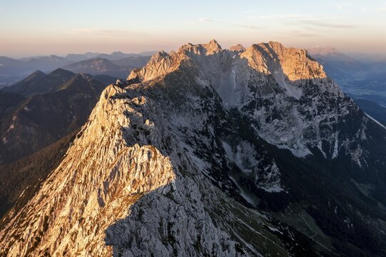 Aerial view, sunset, alpenglow in the mountains, mountain range, Wilder Kaiser, Tyrol, Austria