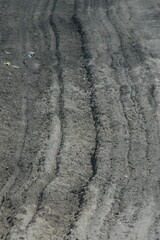 Naklejka premium tire tracks in sand