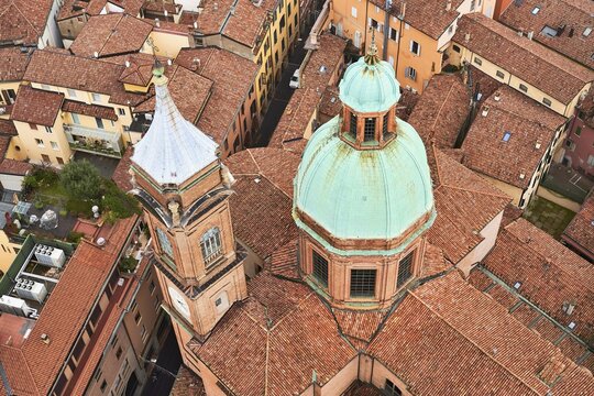 View from the Asinelli Tower of the towers of the churches of Santi Bartolomeo and Gaetano, Old Town, Bologna, Emilia-Romagna, Italy