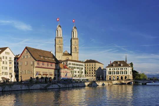Zunfthaus Zum R&uuml;den, twin towers of the Grossm&uuml;nster in the old town of Zurich, Canton Zurich, Switzerland