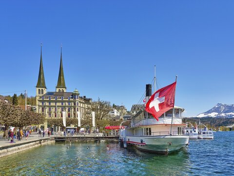 Ship restaurant in front of the court church of St. Leodegar hnten Rigi, Lucerne, Canton Lucerne, Switzerland