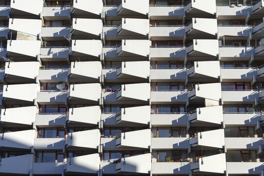 High-rise residential building with balconies and satellite dishes, Trabantenstadt Chorweiler in Cologne, North Rhine-Westphalia, Germany