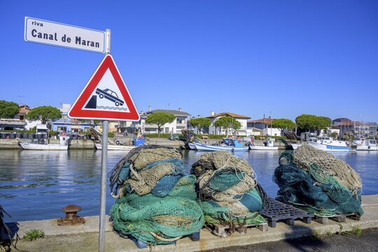Fishing nets and traffic sign, Marano Lagunare, province of Udine, Italy