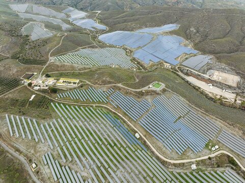 Rows of solar panels at the photovoltaic plant of Lucainena de las Torres, aerial view, drone shot, Almer&iacute;a province, Andalusia, Spain