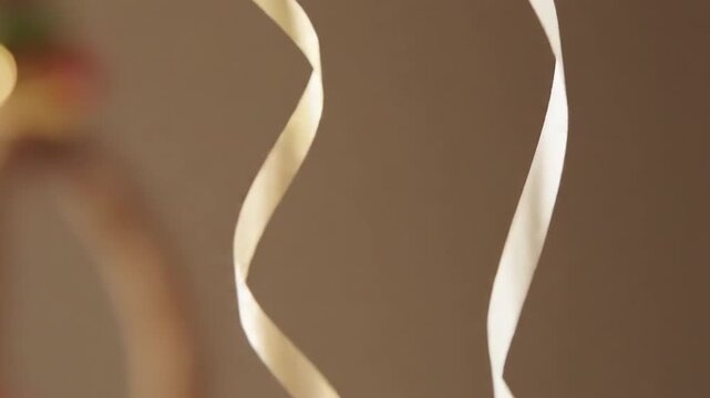 Decorative Ribbon Twirls Creating Festive Atmosphere in Celebration