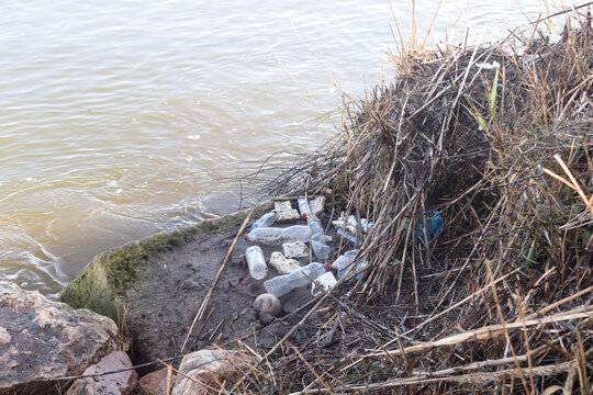 Garbage remains on the banks of the Ter River, Girona province, Catalonia, Spain