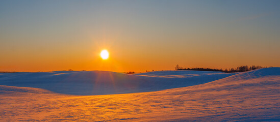 Winter landscape in the evening light