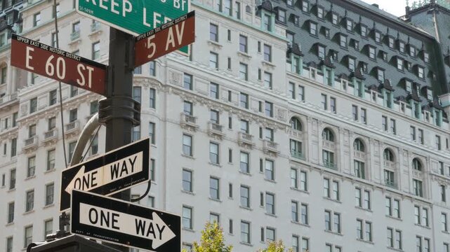 New York City Manhattan Midtown, United States. Old historic hotel building 1907 on Grand Army Plaza, 5 fifth avenue sign near Central Park. Classic iconic american architecture. Pulitzer Plaza in NYC