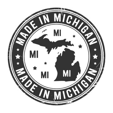 Circular stamp design featuring the state of michigan made in michigan text and small mi labels
