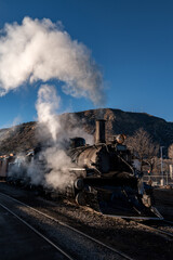 Historic train engine with head of steam