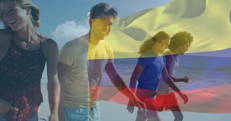 Naklejka premium Walking five adults in summer clothes moving along wet sand at beach, with tricolor flag overlay