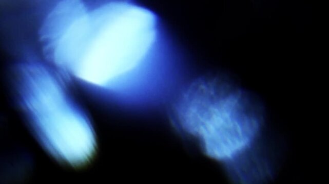 Real Shooted Cinematic Lens Flare Overlay on Black Background at 1000fps Slow Motion.