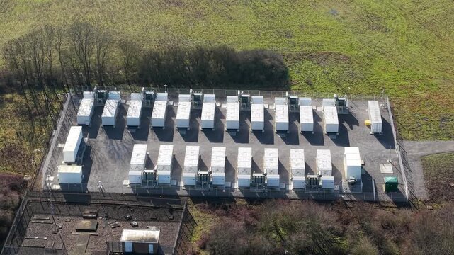 Close up aerial view of a 50MW BESS battery energy storage system at Chape; Farm Luton substation UK for critical grid stability and power supply.