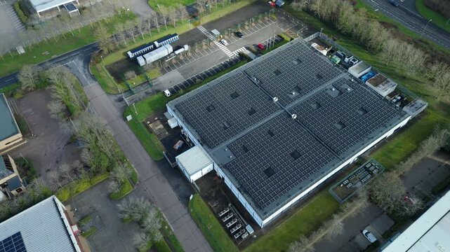 Aerial view of critical tech infrastructure in Milton Keynes featuring a data center with renewable solar power for AI and cloud services.