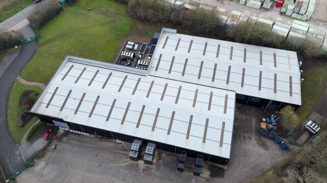Aerial drone view of a small-scale data centre in Northampton, UK, dedicated to critical AI infrastructure and secure cloud computing.