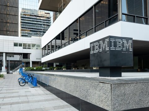Buenos Aires, Argentina - October 25th 2025: IBM offices. Modern corporate building sign with a company logo, reflecting urban business environment and a sustainable transport solution