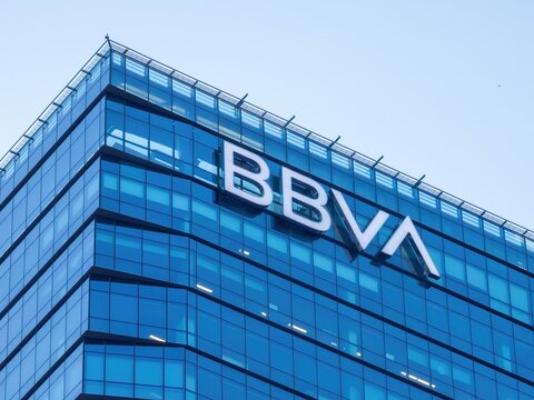 Buenos Aires, Argentina - October 25th 2025: Glass facade of a contemporary high rise building, reflecting global finance concepts, corporate power, and modern architecture