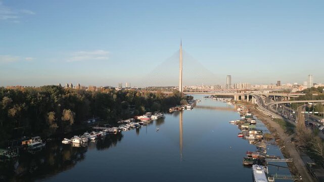 Drone captures a picturesque view of Ada bridge at sunset, Belgrade Serbia.