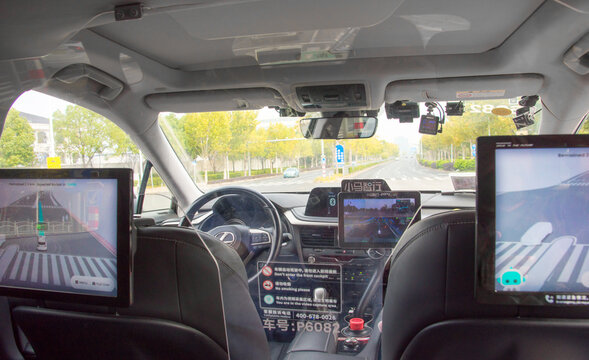 Shanghai, China 1 Nov 2025. Interior of a Level 4 autonomous taxi Robotaxi with real time driving interface, lidar, radar and camera data as the vehicle transports passengers in commercial service.
