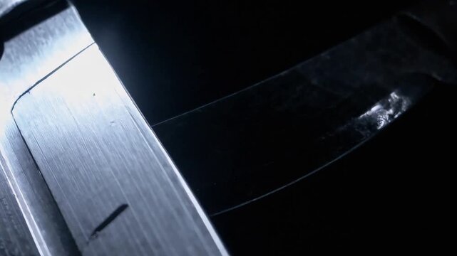 Sharp Metal Blade in Dramatic Light seamless loop