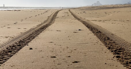 Tire tracks on the sand