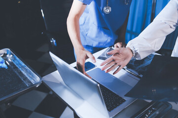 Fototapeta premium Doctors are meeting at the hospital to discuss treatment options and share experiences with colleagues.