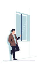 Fototapeta premium Young Man Leaning On Wall Near Modern Window Indoors