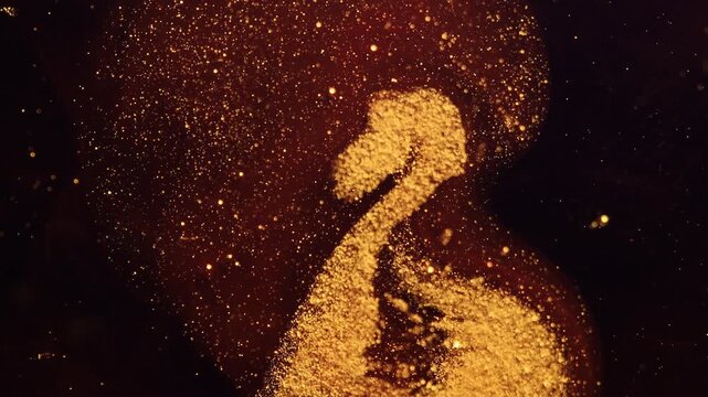 Abstract macro video of shimmering golden particles and tiny bubbles floating in a dark liquid. Elegant fluid motion with sparkling glitter and organic bokeh effects