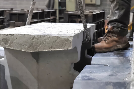 Loading and moving finished concrete product from the mold after