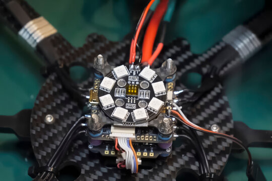 Soldering the power wires to drone controller board