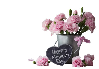 a rustic metal bucket filled with pink carnations, set against an old wooden table. a heart-shaped chalkboard sign is attached to the bucket that reads "happy mother's day" in elegant script. the back