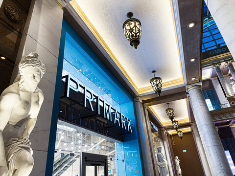 Primark Trafford Centre store interior with marble statues and ornate lighting in Manchester UK