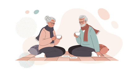 Obraz premium Elderly Couple Enjoying Cozy Beverage Together on Floor