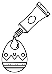 Decorating Easter egg with paint from tube, holiday decoration