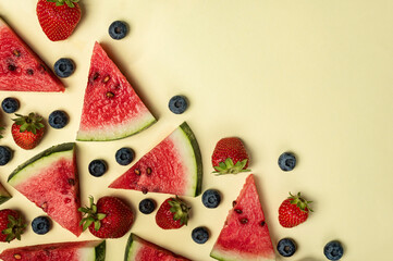 Vibrant summer fruit pattern with watermelon slices, fresh strawberries, and blueberries