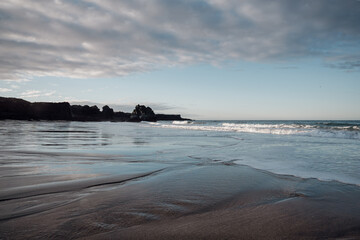 Icy shoreline and calm water on Sn&aelig;fellsnes Peninsula, Iceland