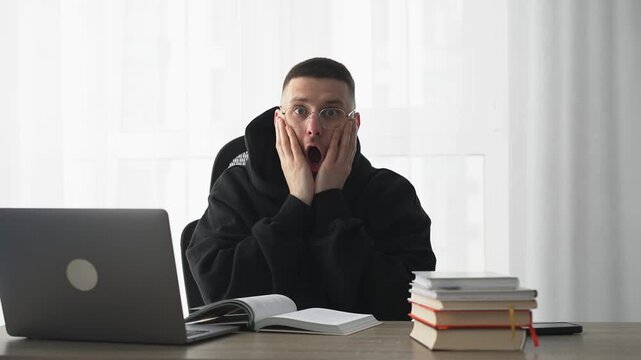 A shocked man.
Wow, what an emotion.
Shock and joy.
A sudden situation.
Surprise at work.
What?