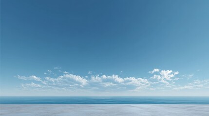 Obraz premium Tranquil Ocean View with Clear Blue Sky and Wispy Clouds Above Calm Waters in an Idyllic Seascape Setting for Relaxation and Inspiration