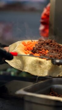Carne Asada Burrito Ingredients Being Prepared &ndash; Close-Up Food Shot